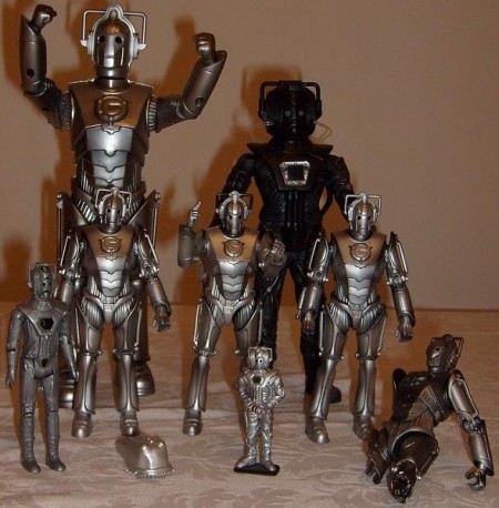 Cybermen: Row 1 - Dapol Cyberman, Cybermat by Product Enterprise, Corgi Cyberman, Destroyed Cyberman.  Row 2 - Character Options Cyberman 5 inch, Cyber Leader, Cyberman with Gun Arm.  Row 3 Character Options 12 inch Cyberman, Product Enterprise Black Cyberman - Thanks Adam