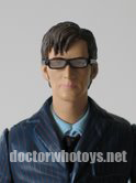 Doctor in Suit and Glasses With Red Plimsoles
